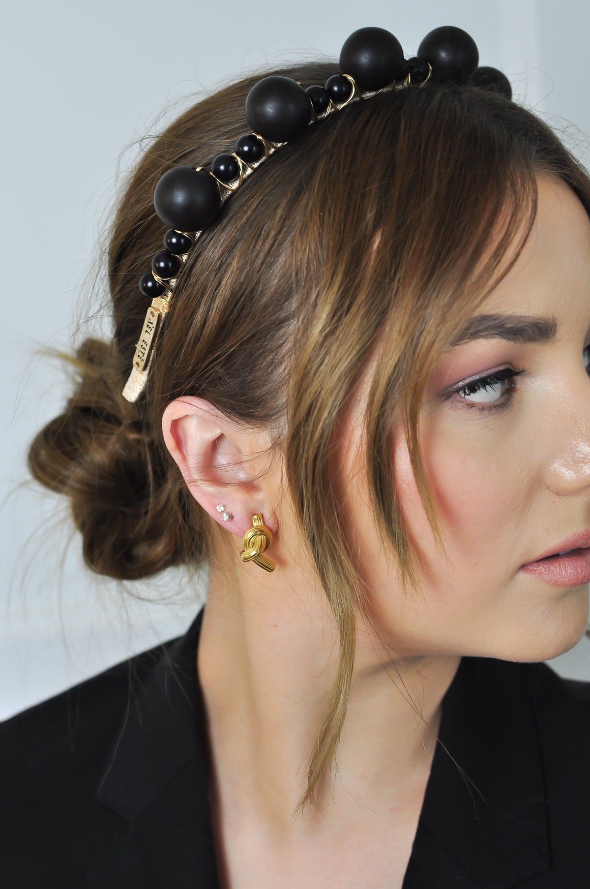derby day headband featuring black beads on a gold headband for spring racing 2026