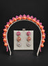 A gold beaded headband with orange beads and pink floral accents, displayed matching drop earrings flower earrings